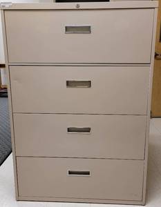 lot 275 image: 4-DRAWER METAL LATERAL FILING CABINET AS SHOWN. APPROX. 36 W x 18 D x 52 H.