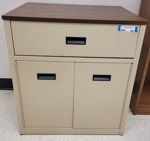 lot 427 image: STORAGE CABINET WITH DRAWER IN STYLE SHOWN. APPROX. 25 W x 27 H x 20 D.