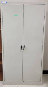 lot 429 image: DOUBLE DOOR METAL STORAGE CABINET AS SHOWN. APPROX. 36 W x 72 H x 18 D.