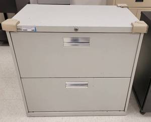 lot 440 image: 2-DRAWER METAL LATERAL FILE CABINET AS SHOWN. APPROX. 30 W x 28 H x 19 D.