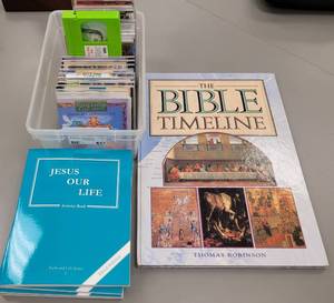 lot 447 image: THE BIBLE TIMELINE BOOK, MUSIC CDS, AND MORE AS SHOWN.