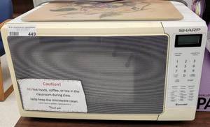 lot 449 image: SHARP MICROWAVE MODEL R-203HW PLUS CUTTING BOARD AS SHOWN.