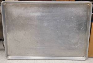 lot 455 image: (4) COMMERCIAL GRADE STAINLESS STEEL FULL SHEET BAKING PANS AS SHOWN. EACH APPROX. 26 W x 18 H. SOLD 4 X THE MONEY