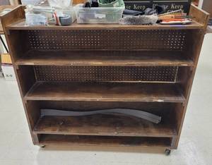 lot 495 image: WOODEN SHELF WITH WHEELS AS SHOWN. CONTENTS NOT INCLUDED APPROX. 48.5 W x 47 H x 12 D.