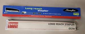lot 528 image: (2) LONG REACH STAPLERS IN BOXES AS SHOWN.