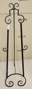 lot 531 image: METAL DECORATIVE EASEL IN STYLE SHOWN. APPROX. 13.5 W X 46.75 H x 16 D.