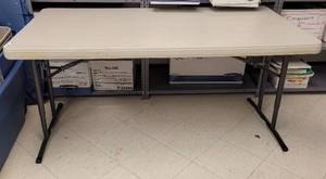 lot 534 image: LIFETIME 5 FOOT FOLDING TABLE AS SHOWN.