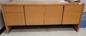 lot 550 image: WOODEN OFFICE CREDENZA IN STYLE SHOWN. APPROX. 73.25 W x 25 D.