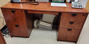lot 552 image: OFFICE DESK IN STYLE SHOWN. CONTENTS NOT INCLUDED APPROX. 59 W x 29.5 D x 29.5 H.