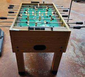 lot 599 image: FOOSBALL TABLE IN STYLE SHOWN. APPROX. 54 L x 29 W x 34.5 H.