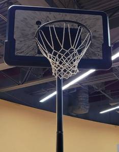 lot 600 image: LIFETIME PORTABLE BASKETBALL HOOP AS SHOWN. APPROX. BASE 44 L x 30 W x 11FT HIGH.