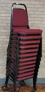 lot 609 image: (12) FABRIC UPHOLSTERED STACK CHAIRS IN STYLE AND COLOR SHOWN. CART NOT INCLUDED SOLD 12 X THE MONEY
