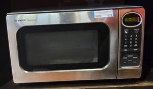 lot 626 image: SHARP MICROWAVE MODEL R-305KS AS SHOWN.
