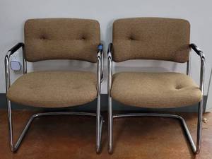 lot 659 image: (2) UPHOLSTERED CHAIRS WITH METAL FRAME IN STYLE SHOWN. SOLD 2 X THE MONEY