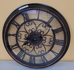 lot 672 image: ROUND DECORATIVE WALL CLOCK IN STYLE SHOWN. APPROX. 20.25 DIA.