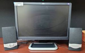 lot 673 image: HP 19 INCH MONITOR MODEL L1908W PLUS MULTIMEDIA COMPUTER SPEAKERS AS SHOWN.