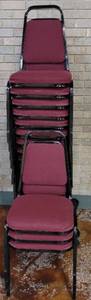 lot 722 image: (15) FABRIC UPHOLSTERED STACK CHAIRS IN STYLE AND COLOR SHOWN. CART NOT INCLUDED SOLD 15 X THE MONEY