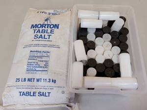 lot 742 image: PLASTIC SALT AND PEPPER SHAKERS PLUS 25 LB MORTON TABLE SALT BAG AS SHOWN.