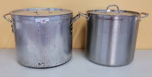 lot 746 image: (2) LARGE STAINLESS STEEL STOCK POTS INCLUDING TRAMONTINA 24 QT AS SHOWN. SOLD 2 X THE MONEY