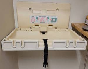 lot 767 image: WALL MOUNT BABY CHANGING STATION AS SHOWN.