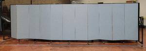 lot 815 image: SCREENFLEX PORTABLE PARTITION WITH 11 PANELS AS SHOWN. COVERS APPROX. 22 FT. (EXTENDED)