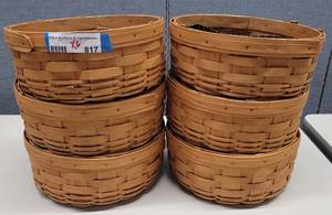 lot 817 image: (6) LONGABERGER BASKETS IN STYLE SHOWN. EACH APPROX. 10.25 W x 4.25 H. SOLD 6 X THE MONEY