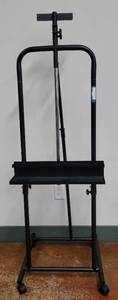lot 821 image: PORTABLE EASEL ON WHEELS AS SHOWN. APPROX. 21.25 W x 20 D x 64.5 H.