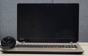 lot 828 image: TOSHIBA SATELLITE SKULLCANDY LAPTOP MODEL L50-B WITH CHARGER AS SHOWN. NO HARD DRIVE.