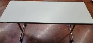 lot 856 image: HEAVY DUTY OFFICE TABLE WITH WHEELS AS SHOWN. APPROX. 60 W x 24 D x 30.75 H.