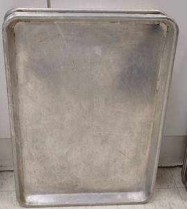 lot 880 image: (6) COMMERCIAL GRADE STAINLESS STEEL HALF SHEET BAKING PANS AS SHOWN. EACH APPROX. 18 W x 13 H. SOLD 6 X THE MONEY