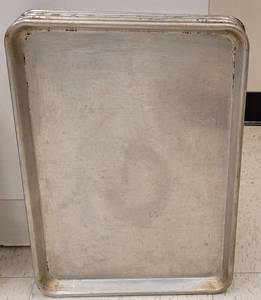 lot 881 image: (6) COMMERCIAL GRADE STAINLESS STEEL HALF SHEET BAKING PANS AS SHOWN. EACH APPROX. 18 W x 13 H. SOLD 6 X THE MONEY