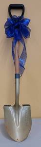 lot 554 image: CEREMONIAL GROUND BREAKING SHOVEL SIGNED BY BISHOP MICHAEL OLSON. THIS CRAFTSMAN SHOVEL WAS USED FOR THE GROUND BREAKING CEREMONY AT THE NEW ST. PHILIP CHURCH.
