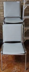 lot 664 image: (6) STACKABLE VINYL UPHOLSTERED GRAY CHAIRS WITH CHROME FRAME AS SHOWN. SOLD 6 X THE MONEY