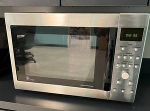 lot 898 image: GE PROFILE MICROWAVE  CONVECTION OVEN AS SHOWN. APPROX. 22.5 W x 16 D x 15 H.