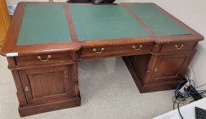 lot 416 image: SOLID WOOD OFFICE DESK IN STYLE SHOWN. CONTENTS NOT INCLUDED