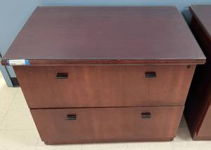 lot 569 image: WOODEN 2-DRAWER LATERAL FILE CABINET WITH GLASS TOP IN STYLE SHOWN. CONTENTS NOT INCLUDED