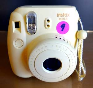 lot 9 image: Fujifilm Instax Mini 8 Instant Film Camera - $$