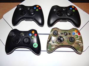 lot 94 image: XBOX 360 WIRELESS GAME CONTROLLERS (X4)