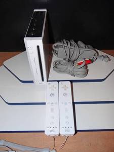 lot 96 image: Wii GAMING SYSTEM AS SHOWN WITH 2 CONTROLLERS CHARGERSENSOR BAR - MODEL RVL-001
