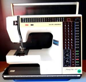 lot 124 image: VINTAGE New HomeJanome Sewing machine Memory Craft 6000