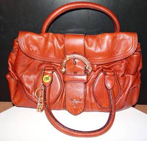 lot 135 image: PRADA HANDBAG AS SHOWN