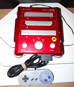 lot 255 image: Hyperkin RetroN 3 Gaming Console 2.4 GHz Edition for SNES Genesis M07168-LR Red