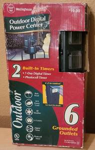 lot 20 image: WESTINGHOUSE HOLIDAY 6 GROUNDED OUTDOOR DIGITAL POWER CENTER WITH BUILT IN DUAL TIMERS IN BOX AS SHOWN.