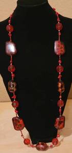 lot 27 image: LONG NECKLACE IN STYLE AND COLOR AS SHOWN.