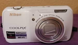 lot 31 image: NIKON COOLPIX 10X WIDE OPTICAL ZOOM ED VR AS SHOWN. POWERS ON. CHARGER NOT INCLUDED.