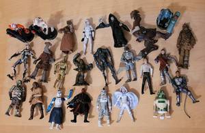 lot 35 image: (24) COLLECTIBLE FIGURES INCLUDING STAR WARS AS SHOWN. (SOLD 24 X THE MONEY)