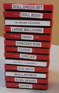 lot 82 image: SIZZIX LARGE RED DIE CUTTERS IN STYLES AS SHOW. (SOLD 13 X THE MONEY)