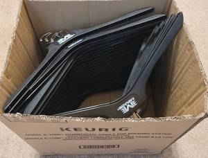 lot 84 image: BOX OF PLASTIC HANGERS AS SHOWN.