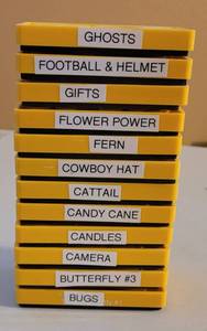 lot 128 image: SIZZIX MEDIUM YELLOW DIE CUTTERS IN STYLES AS SHOWN. (SOLD 12 X THE MONEY)