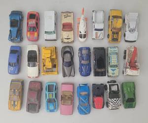 lot 138 image: (24) VINTAGE TOY CARS IN STYLES AS SHOWN.